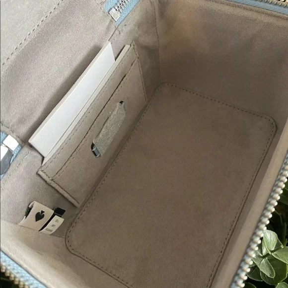 Kate Spade Bon Voyage Off The Grid Trunk crossbody